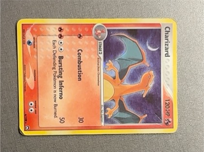Charizard ex, graded 2.5