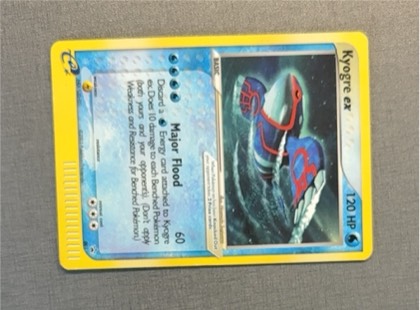 Kyogre ex - 001 (Nintendo Power Magazine), graded 6.5