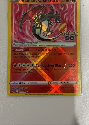 Radiant Charizard, graded 7.5