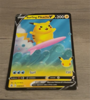 Surfing Pikachu V, graded 9.0