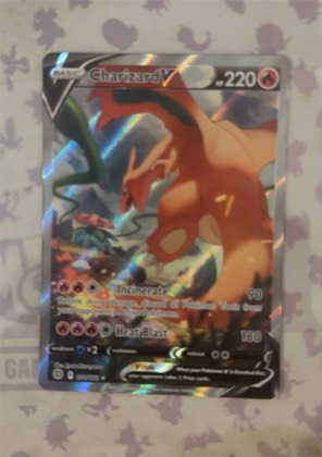 Charizard V (Alternate Full Art) graded 6 & below