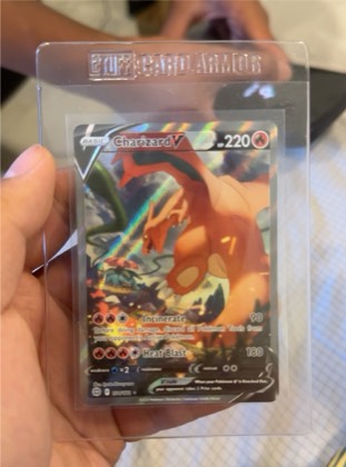 Charizard V (Alternate Full Art), graded 1.5