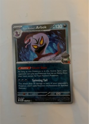 Team Rocket's Arbok, graded 9.0