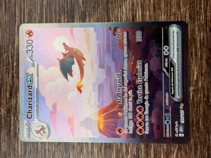 Charizard ex, graded 8.5