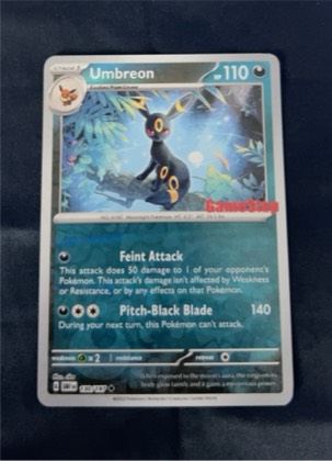 Umbreon (Obsidian Flames Stamped), graded 8.5