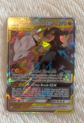 Reshiram & Zekrom GX, graded 8.0