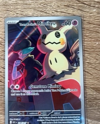 Team Rocket's Mimikyu, graded 9.0