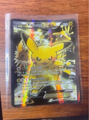 Pikachu EX - XY124, graded 3.5