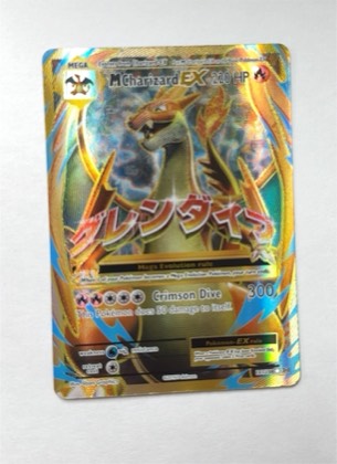 M Charizard EX (Full Art), graded 7.0