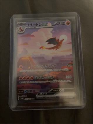 Charizard ex, graded 9.0