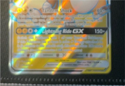 Alolan Raichu, graded 2.5