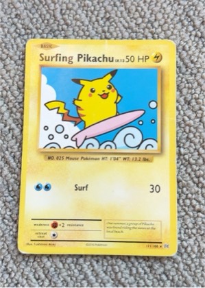 Surfing Pikachu, graded 4.0