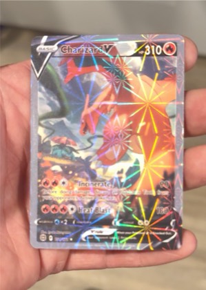 Charizard V graded 6 & below