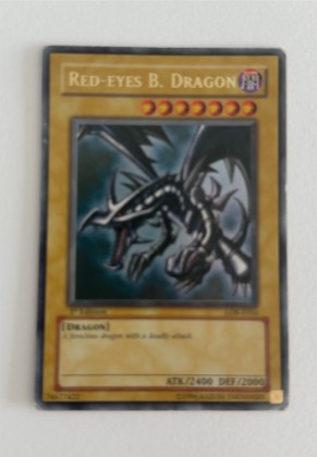 Red-Eyes B. Dragon, graded 6.0