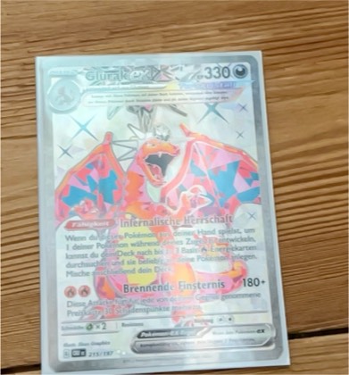 Charizard ex, graded 9.0