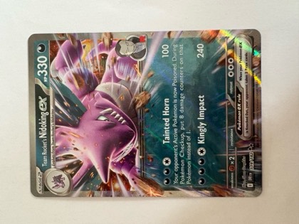 Team Rocket's Nidoking ex, graded 5.0