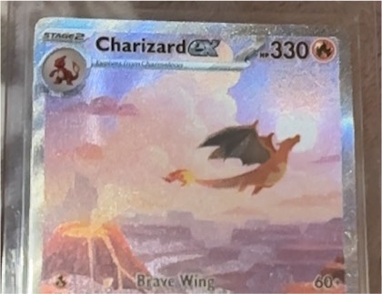 Charizard ex, graded 9.0