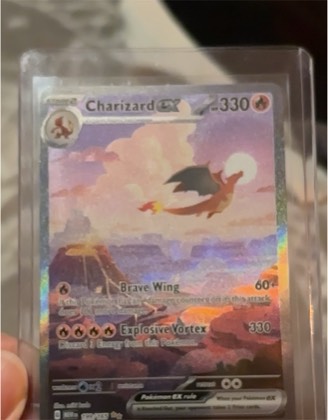 Charizard ex, graded 7.5