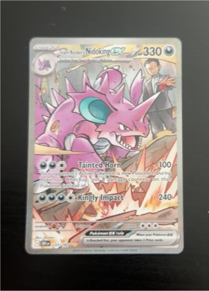 Team Rocket's Nidoking ex, graded 8.5