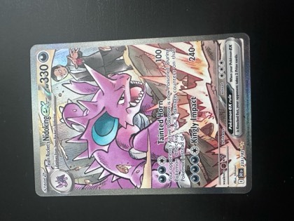 Team Rocket's Nidoking ex, graded 9.0