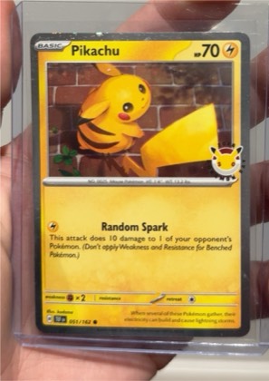 Pikachu - 051/162 (Cosmo Holo), graded 2.5