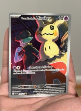 Team Rocket's Mimikyu, graded 2.5