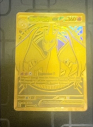 Charizard ex, graded 9.0