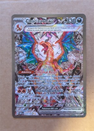 Charizard ex, graded 9.0