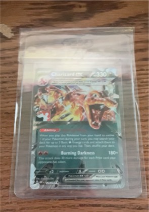Charizard ex, graded 2.5