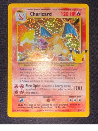 Charizard (Celebrations Metal Card) graded 8.5