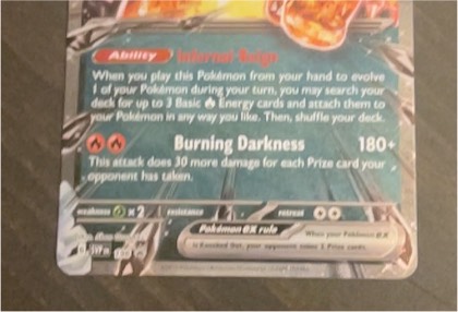 Charizard ex, graded 7.0