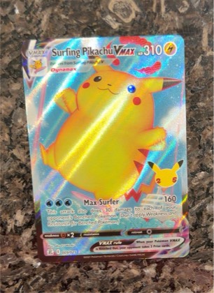 Surfing Pikachu VMAX, graded 9.0