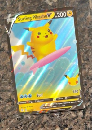 Surfing Pikachu V, graded 5.5