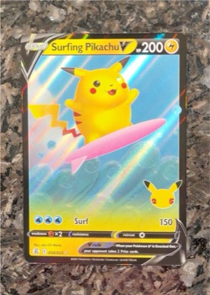 Surfing Pikachu V, graded 8.5