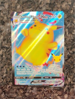 Surfing Pikachu VMAX, graded 9.0