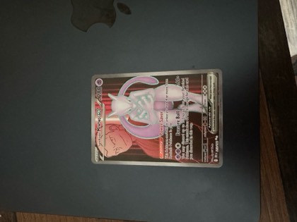 Team Rocket's Mewtwo ex graded 9.5