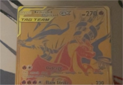 Reshiram & Charizard-GX graded 8.5