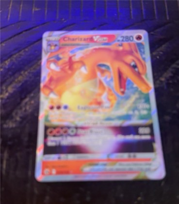 Charizard VSTAR, graded 8.5