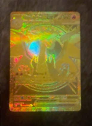 Charizard ex, graded 8.5