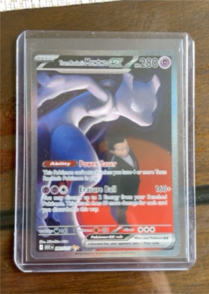 Team Rocket's Mewtwo ex graded 8.5