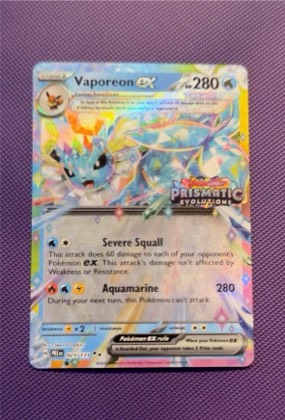 Vaporeon ex - 023/131 (Prismatic Evolutions Stamp), graded 5.5