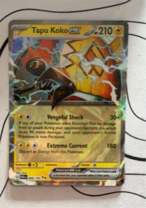 Tapu Koko ex, graded 7.5