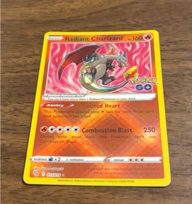 Radiant Charizard graded 8