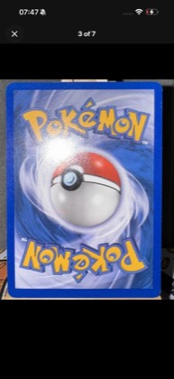 Unown (?), graded 7.0