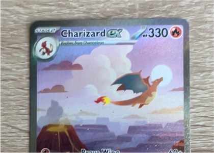 Charizard ex, graded 9.0