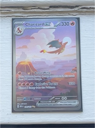 Charizard ex, graded 9.0