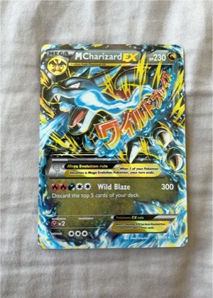 M Charizard EX (X) graded 8