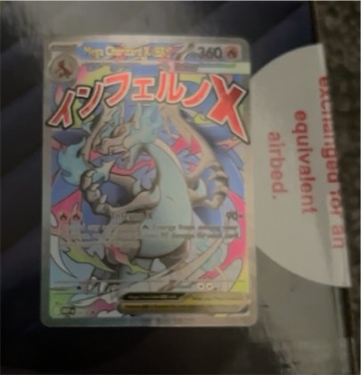 Mega Charizard X ex, graded 7.0