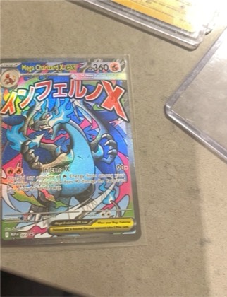 Mega Charizard X EX, graded 8.5