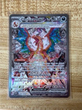 Charizard ex, graded 9.0